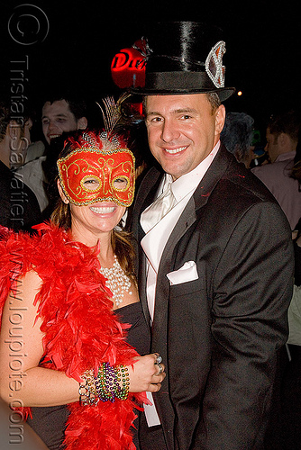 ghostship halloween party on treasure island (san francisco), costume, feather boa, feathers, ghostship 2009, halloween, man, mask, party, red, stove pipe hat, woman