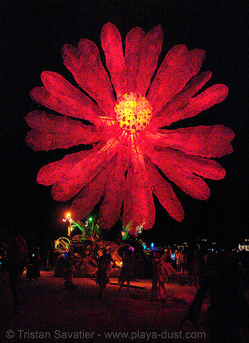 giant red flower - miracle grow aka hope flower - burning-man 2006, art car, burning man art cars, burning man at night, giant flower, glowing, miracle grow, mutant vehicles, red