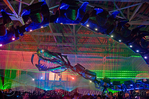 giant snake skeleton animated sculpture - opulent temple massive rave party (treasure island, san francisco) - serpent mother, art installation, green laser, laser lightshow, laser show, lasers, night, nightclub, opulent temple, sculpture, serpent mother, skeleton, snake