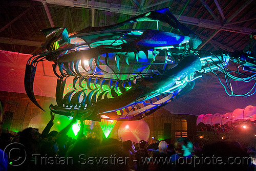 giant snake skeleton animated sculpture - opulent temple massive rave party (treasure island, san francisco) - serpent mother, art installation, fangs, green laser, head, laser lightshow, laser show, lasers, night, nightclub, opulent temple, sculpture, serpent mother, skeleton, snake, teeth