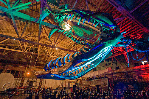 giant snake skeleton animated sculpture - opulent temple massive rave party (treasure island, san francisco) - serpent mother, art installation, fangs, green laser, head, laser lightshow, laser show, night, opulent temple, sculpture, serpent mother, skeleton, snake, teeth