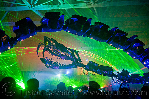 giant snake skeleton animated sculpture - opulent temple massive rave party (treasure island, san francisco) - serpent mother, art installation, fangs, green laser, laser lightshow, laser show, lasers, night, nightclub, opulent temple, sculpture, serpent mother, skeleton, snake