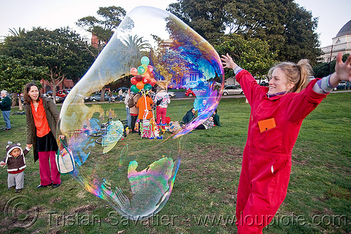 giant soap bubble, big bubble, giant bubble, iridescent, lawn, park, playing, red, soap bubbles, woman