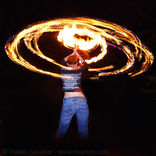 gina spinning a fire hula hoop (san francisco), fire dancer, fire dancing, fire hula hoop, fire performer, fire spinning, hula hooping, night, spinning fire