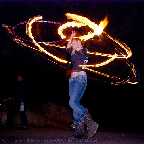 gina spinning a fire hula hoop (san francisco), fire dancer, fire dancing, fire hula hoop, fire performer, fire spinning, hula hooping, night, spinning fire