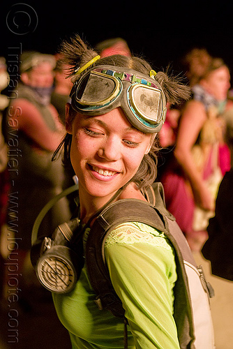 girl dancing on the night of the burn - erin at burning man, 3m respirator, attire, burning man outfit, dryad siren, dust mask, goggles, respirator cartridges, woman