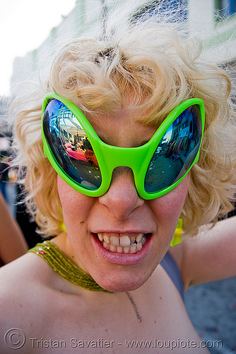 girl with alien sunglasses - how weird street fair (san francisco), alien sunglasses, blonde, close encounter, extraterrestrial, teeth, woman