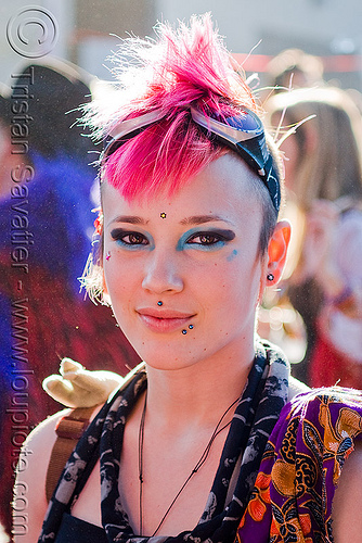 girl with pink mohawk - draya (san francisco), backlight, blue, draya, goggles, makeup, mohawk hair, piercing, pink hair, woman