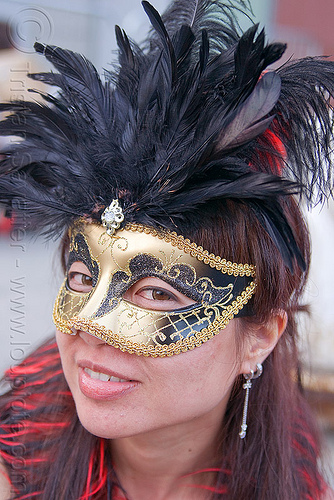 golden carnival mask, carnival mask, feather headdress, woman