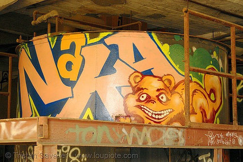 graffiti on tank - abandoned factory (san francisco), derelict, graffiti, industrial tank, naka, street art, tie's warehouse, trespassing