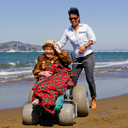 grandma and granddaughter at the beach - beach wheelchair, beach wheelchair, blanket, chinese woman, crissy field beach, family, grandma, grandmother, jenn, old woman, sand, senior, straw hat, women
