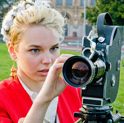 hanna mace adjusting her bolex 16mm movie camera, 16mm camera, blonde, bolex, camera operator, film camera, film making, hannah, motion picture camera, movie camera, woman