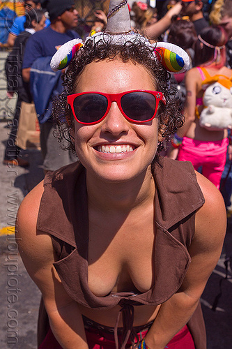 hannah - red sunglasses, curly hair, gay pride festival, hannah, party fashion, rainbow headband ears, red sunglasses, unicorn headband, woman