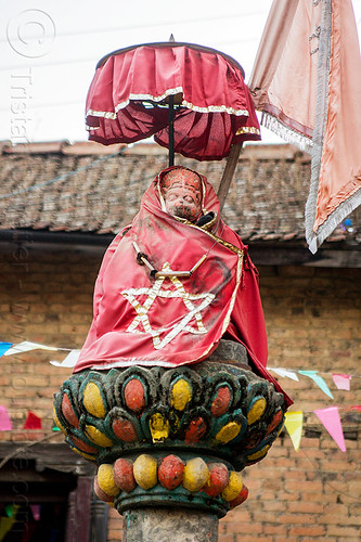 hanuman on column - bagh bhairav temple - kirtipur (nepal), bagh bhairav temple, column, hanuman, hindu temple, hinduism, kirtipur, red, sculpture, star, statue, umbrella