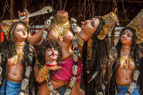 hindu goddess kali with severed heads drinking blood (india), beheaded, blood, decapitated, deities, drinking, goddess, gods, gore, gory, hindu pilgrimage, hinduism, kali maa, kumbh mela, sculpture, severed heads, statue