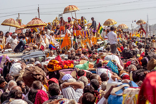 hindu guru float parade in massive traffic jam in crowded street - kumbh mela (india), crowd, float, gurus, hindu pilgrimage, hinduism, kumbh maha snan, kumbh mela, mauni amavasya, parade, umbrellas