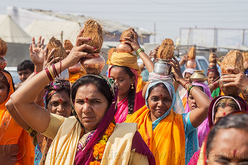 hindu women carrying coconut offerings (india), carrying on the head, coconut offerings, crowd, hindu pilgrimage, hinduism, india, maha kumbh mela, walking, women