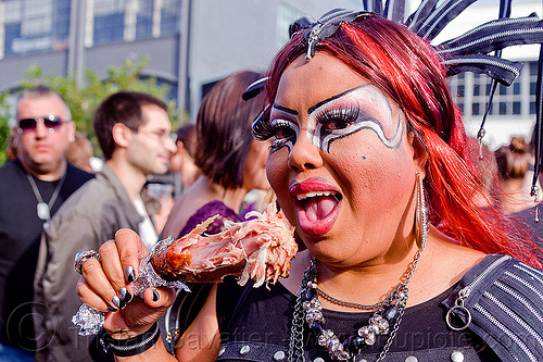 holy mcgrail eating roasted turkey drumstick, barbecued, bbq, bio drag-queen, bio queen, cooked turkey, drag queen, eating, faux queen, finger food, holy mcgrail, makeup, red hair, snack, street food, turkey drumstick, turkey leg, turkey meat, woman