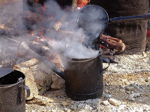 hot asphalt in watering can - vietnam, burning, fire, groundwork, hot asphalt, hot bitumen, pavement, paving, road construction, roadworks, smoke, smoking