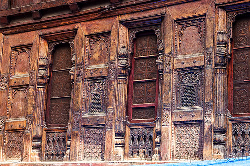 house facade with intricate wood carvings in almora (india), almora, carved, facade, house, intricate, low relief, windows, wood carving, wooden