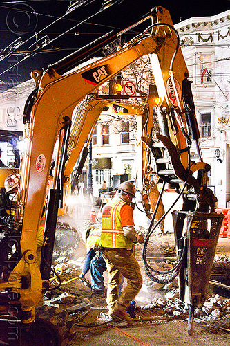 hydraulic jackhammers - muni railway construction site (san francisco), at work, attachment, demolition, excavators, high-visibility jacket, high-visibility vest, hydraulic jackhammer, light rail, man, muni, ntk, overhead lines, railroad construction, railroad tracks, railway tracks, reflective jacket, reflective vest, safety helmet, safety vest, san francisco municipal railway, track maintenance, track work, worker, working