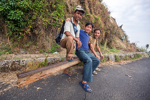 indian people near the darjeeling road landslide (india), broken, darjeeling, india, men, mountain road, rail, sitting, tindharia landslide