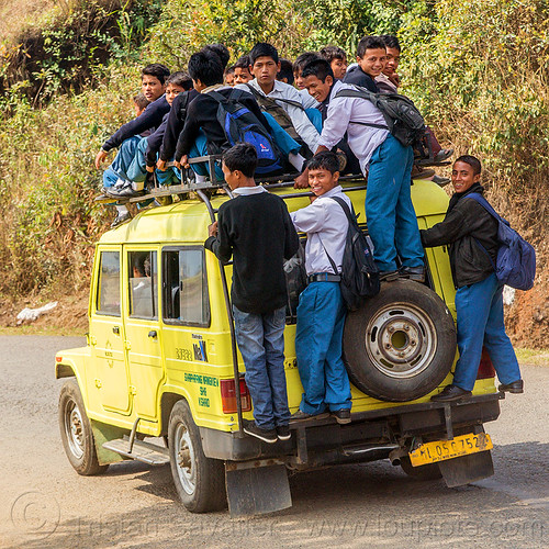 indian school bus - overloaded car (india), 4x4, boys, car, children, crowd, east khasi hills, india, indigenous, kids, mahindra maxx, meghalaya, nangkiew, overloaded, road, school bus, school jeep, shaphrang, yellow