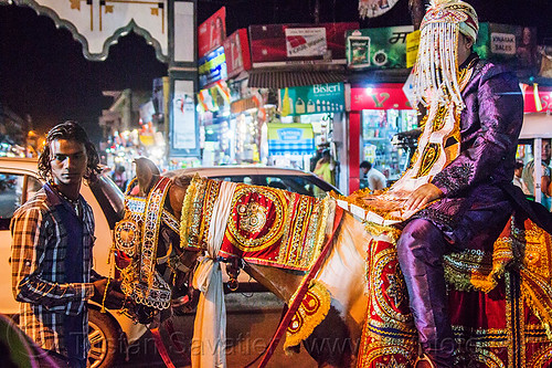 indian wedding - groom riding decorated horse (india), bank notes, costume, decorated horse, fly fringes, fringes veil, groom, hat, headdress, india, men, money, night, rishikesh, wedding