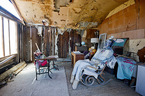inside a dilapidated cabin - darwin ghost town, cabin, darwin, death valley, dilapidated, ghost town, inside, interior, mannequin, peeling paint, puppet, rocking chair