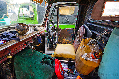 inside an old bemo cabin (jakarta), autorickshaw, becak, bemo, cabin, daihatsu midget, fuel, gas can, gasoline, inside, interior, jakarta, jerrycan, midget i, motor oil, petrol, plastic can, rickshaw, seat, steering wheel, three wheeler