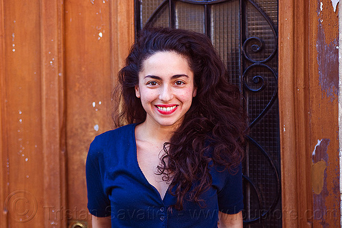 italian girl with long curly hair, brunette, curly hair, dilve, door window, house door, ironwork, italian woman, long hair, red lipstick
