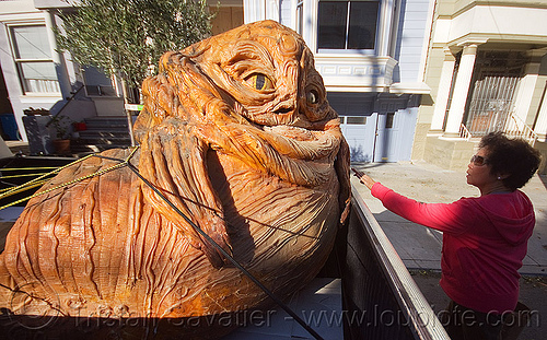 jabba the hutt in a pickup truck, character, giant muppet, jabba the hutt, pickup truck, ropes, special effects, starwars, woman