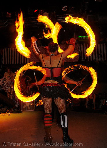 jaden and ro spinning staffs - lsd fuego, bohemian carnival, double staff, fire dancer, fire dancing, fire performer, fire spinning, fire staffs, fire staves, night, spinning fire