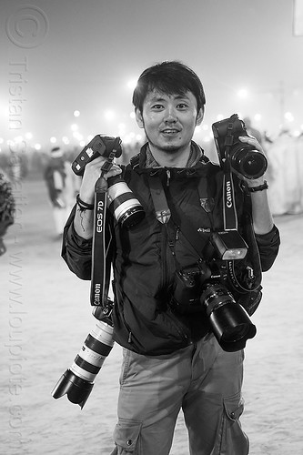 japanese professional press photographer at the kumbh mela 2013 (india), canon cameras, hindu pilgrimage, kumbh mela, man, press photographer, vasant panchami snan