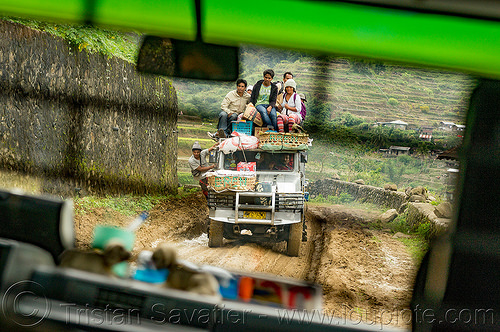 jeepney on muddy road with passengers on roof (philippines), cordillera, dirt road, jeepneys, mud, muddy, passengers, roof, sitting