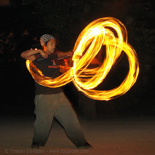 john-paul spinning fire poi at tire beach (san francisco), fire dancer, fire dancing, fire performer, fire poi, fire spinning, john-paul, night, spinning fire