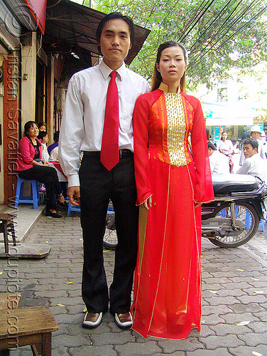 just married couple - vietnam, asian woman, dressed-up, just married, long dress, man, red dress, red tie, suit