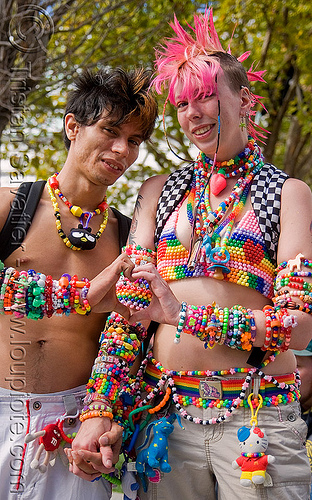 kandi kids - couple, beads, clothing, fashion, finger heart, guy, heart sign, kandi bracelets, kandi cuffs, kandi kid, kandi raver, lovevolution, man, pink mohawk, raver outfits, woman