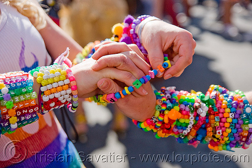 kandi kids swapping bracelets, arm, beads, bracelets, clothing, fashion, hands, handshake, kandi cuffs, kandi kid, kandi raver, lovevolution, passing, swapping, wrists