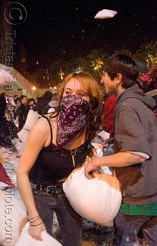 kat at the giant pillow fight (san francisco) 2009, bandana, down feathers, face mask, kat, night, pillows, woman, world pillow fight day