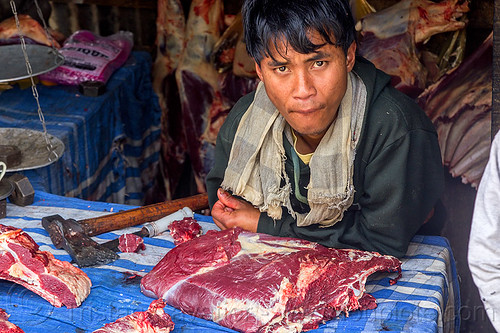khasi butcher with ax and beef meat in meat shop in meghalaya (india), beef, butcher, east khasi hills, indigenous, man, meat market, meat shop, meghalaya, pynursla, raw meat