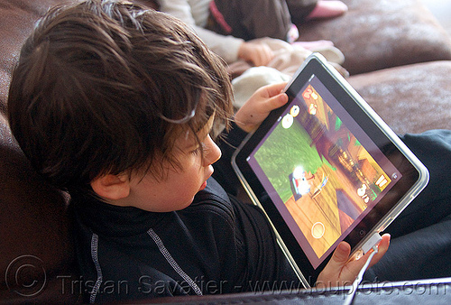 kid playing a video game on an ipad, boy, child, ipad, kid, playing, tablet computer, video game