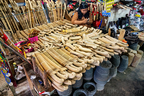 knife shop at the rantepao market, bolu market, pasar bolu, rantepao, tana toraja, woman