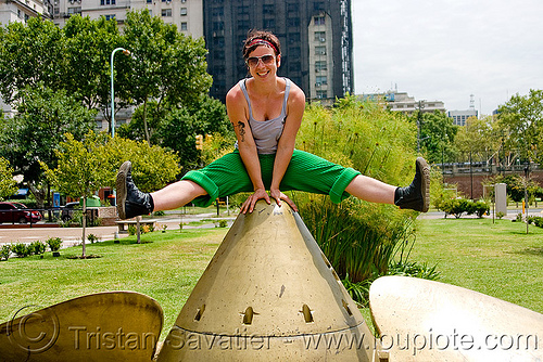 krista playing on a giant ship propeller (buenos aires), argentina, buenos aires, krista, large boat propeller, large ship propeller, marine, monument, puerto madero, woman