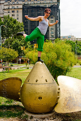 krista  playing on a giant ship propeller (buenos aires), argentina, buenos aires, krista, large boat propeller, large ship propeller, marine, monument, puerto madero, woman