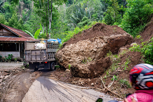 land slide - truck squeezes around huge boulder fell on road, boulder, landslide, road, tana toraja