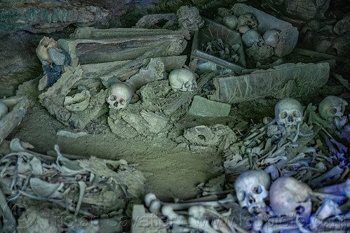 latea burial cave - scattered human bones and skulls, burial site, cemetery, coffins, graveyard, gua latea, human bones, human skulls, latea burial caves, latea cave, skeletons