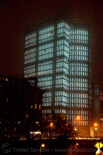 the LED-light-morphing uniqa tower in vienna, building, glowing, high-rise, led lights, morphing, night, tower, twists and turns, vienna, wien
