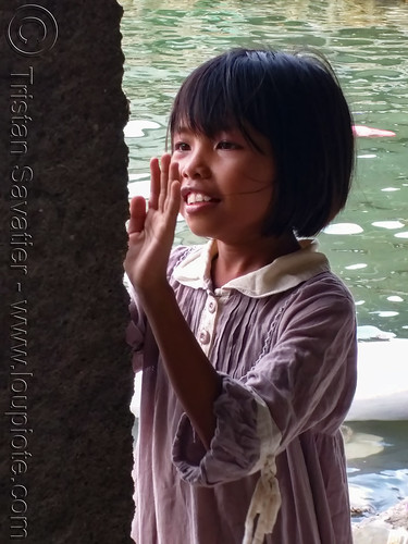 little girl playing in a fishermen's village, child, kid, little girl, playing