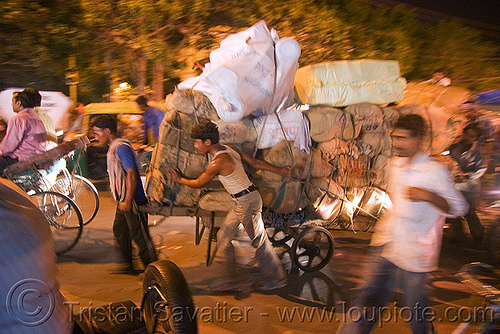 load bearer wallahs carrying heavy load of freight - delhi (india), delhi, freight, load bearer, men, night, wallah